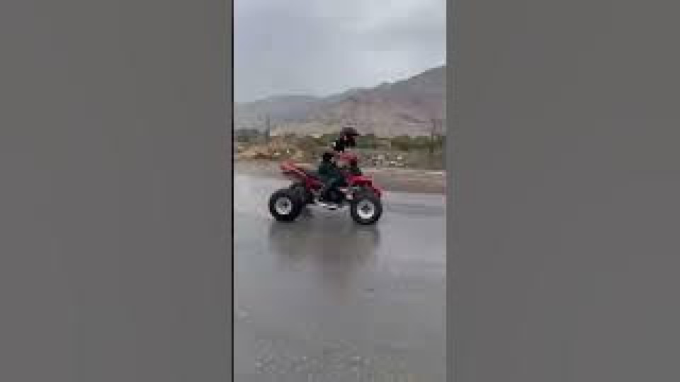 ATV Riders Spin Down Street Buzz Videos